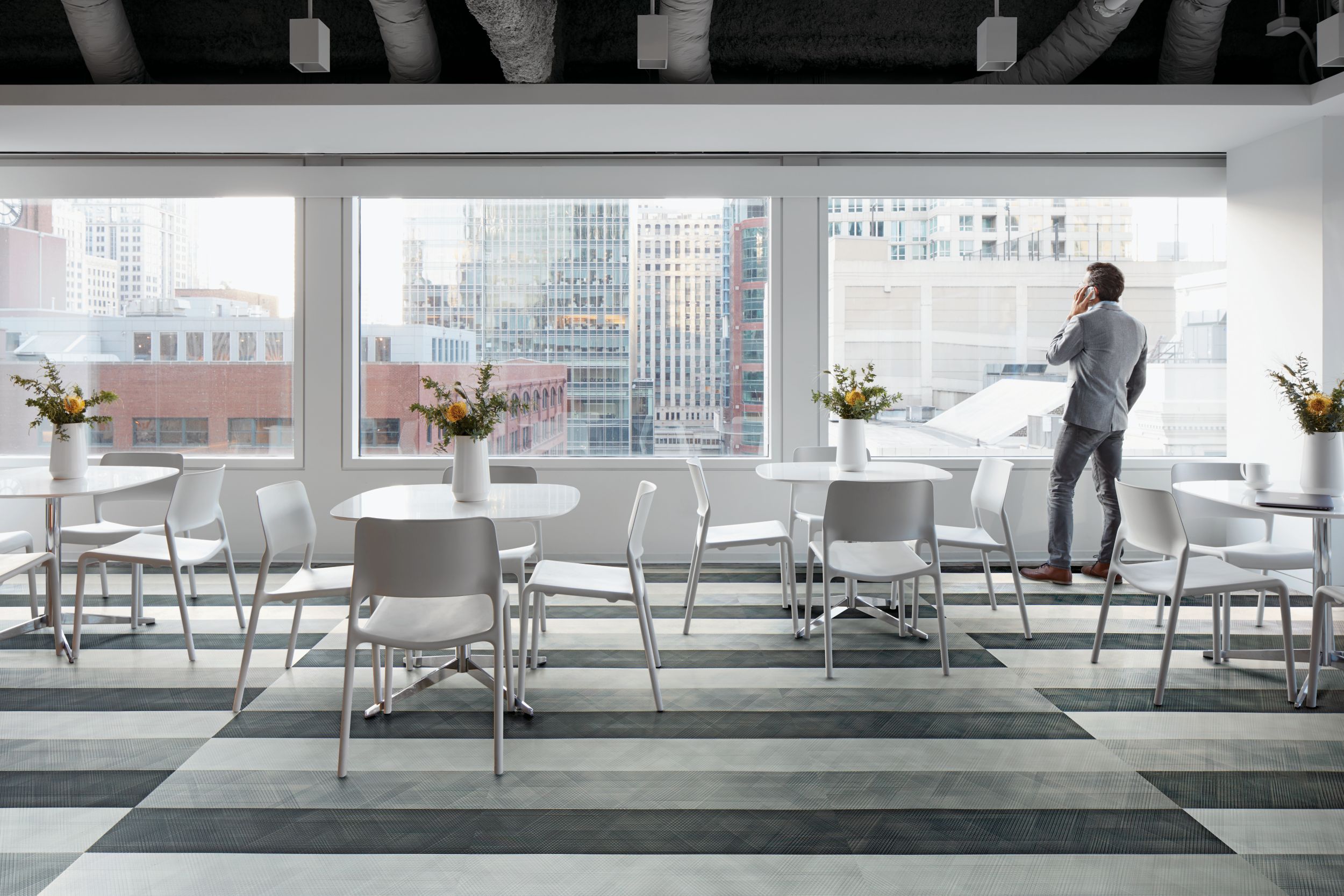 Interface Drawn Lines LVT in cafeteria setting with small tables and chairs  image number 10